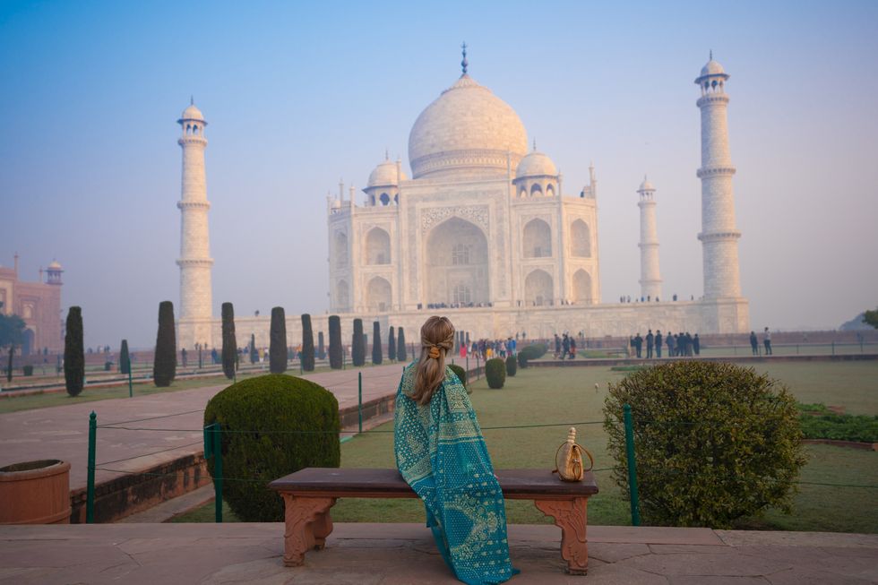 people visiting the magnificent taj mahal in agra