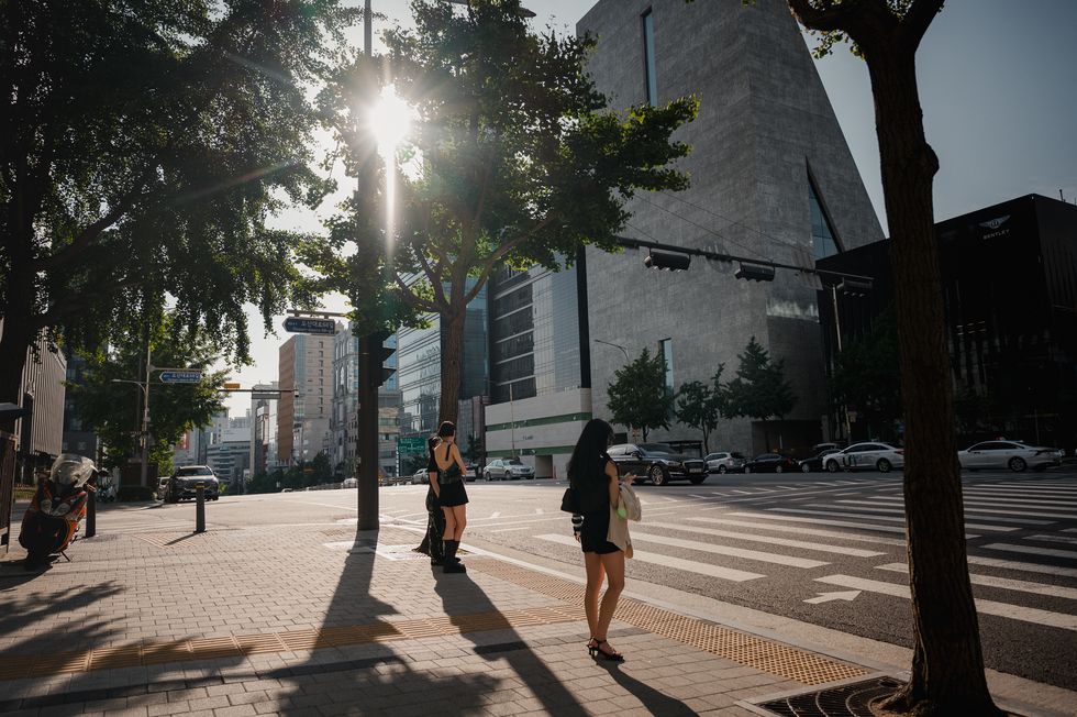 seoul, south korea june 4 people wait at a crosswalk on the