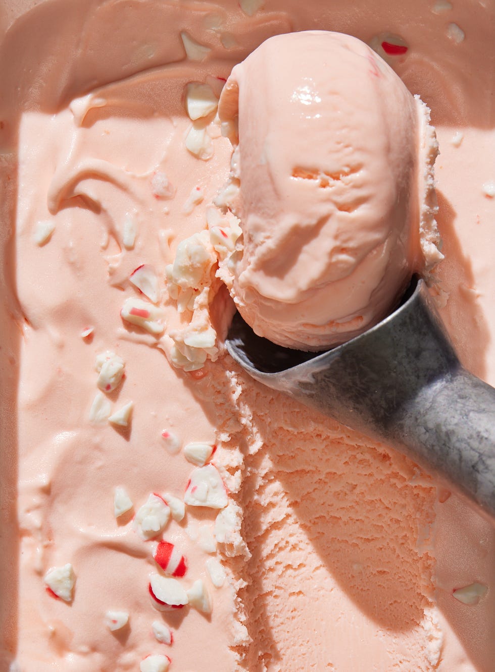 pink peppermint ice cream with crushed peppermint candy