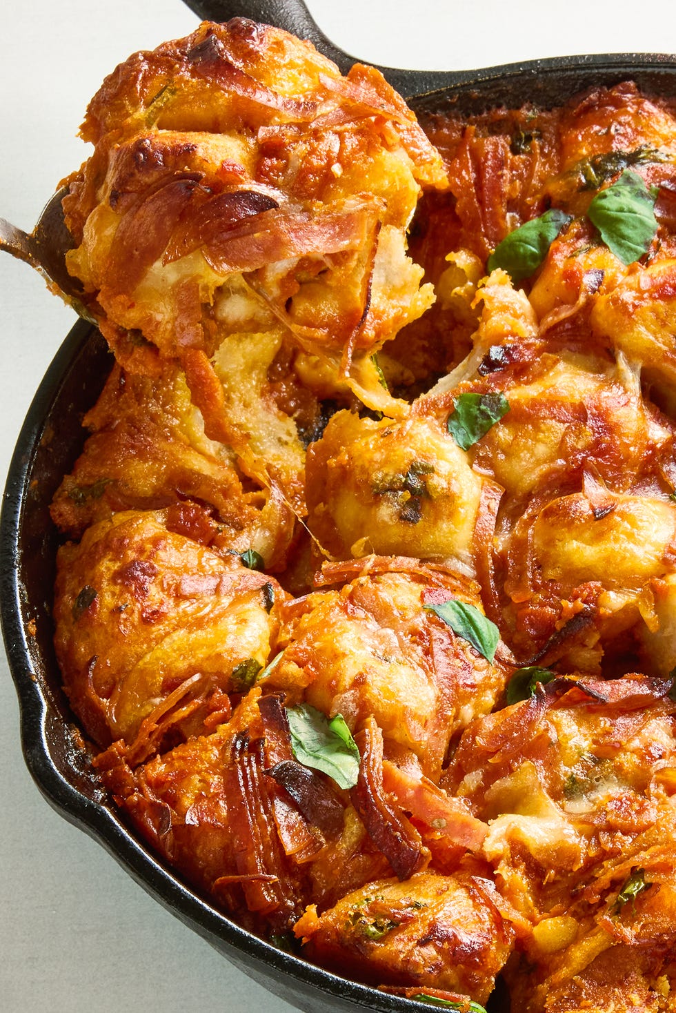 Pepperoni Pizza Biscuit Skillet biscuits with cheese, pepperoni, and marinara in a skillet