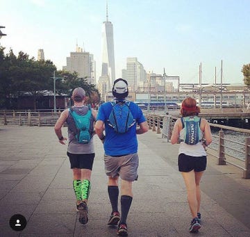 Runners running in front of Freedom Tower