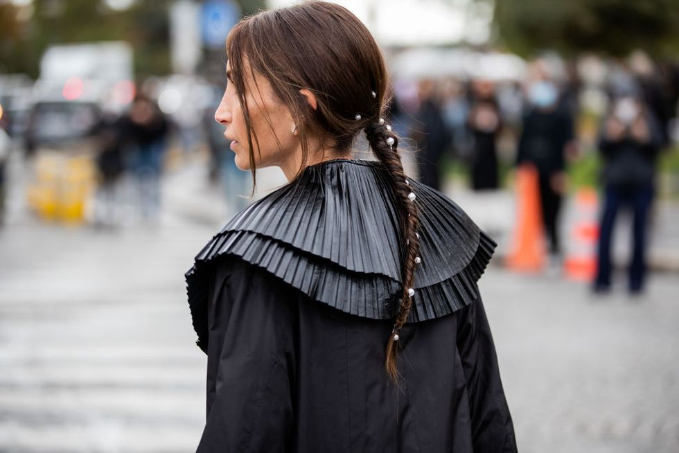 paris, france   october 06 chloe harrouche seen wearing black coat, hair clip, pearls outside chanel during paris fashion week   womenswear spring summer 2021  day nine on october 06, 2020 in paris, france photo by christian vieriggetty images