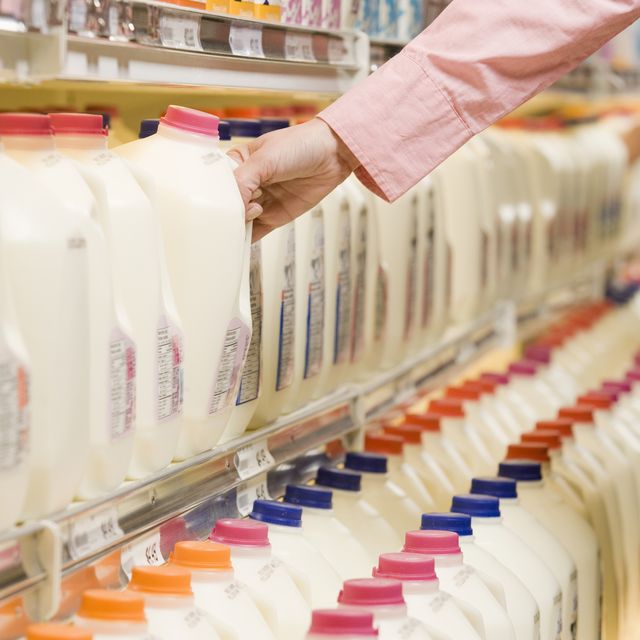 https://hips.hearstapps.com/hmg-prod/images/person-lifting-milk-jug-from-dairy-aisle-shelf-royalty-free-image-1701276578.jpg?crop=0.667xw:1.00xh;0.138xw,0&resize=640:*