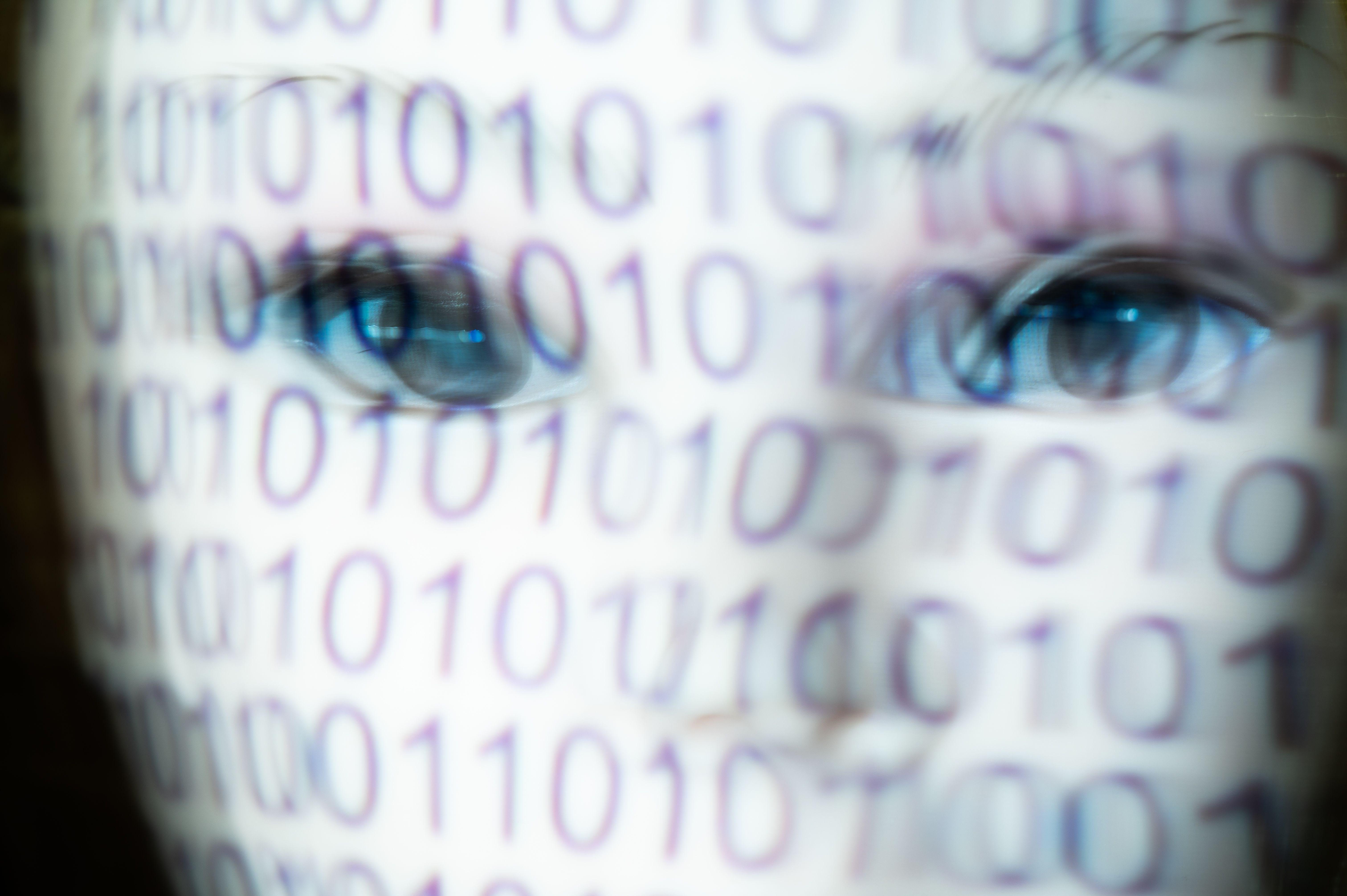 person-with-a-white-mask-and-a-binary-code-on-the-royalty-free-image-1750191965.pjpeg