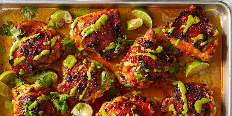 peruvian style chicken drizzled with green sauce and served with lime