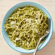 creamy green pesto ramen topped with a sprinkling of parmesan cheese