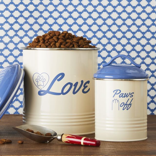 a group of white and blue containers with dog food in them