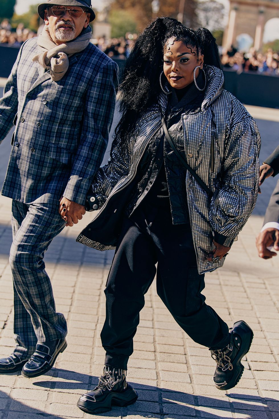 Janet Jackson Walks in Punk Boots & Sequin Puffer for Louis