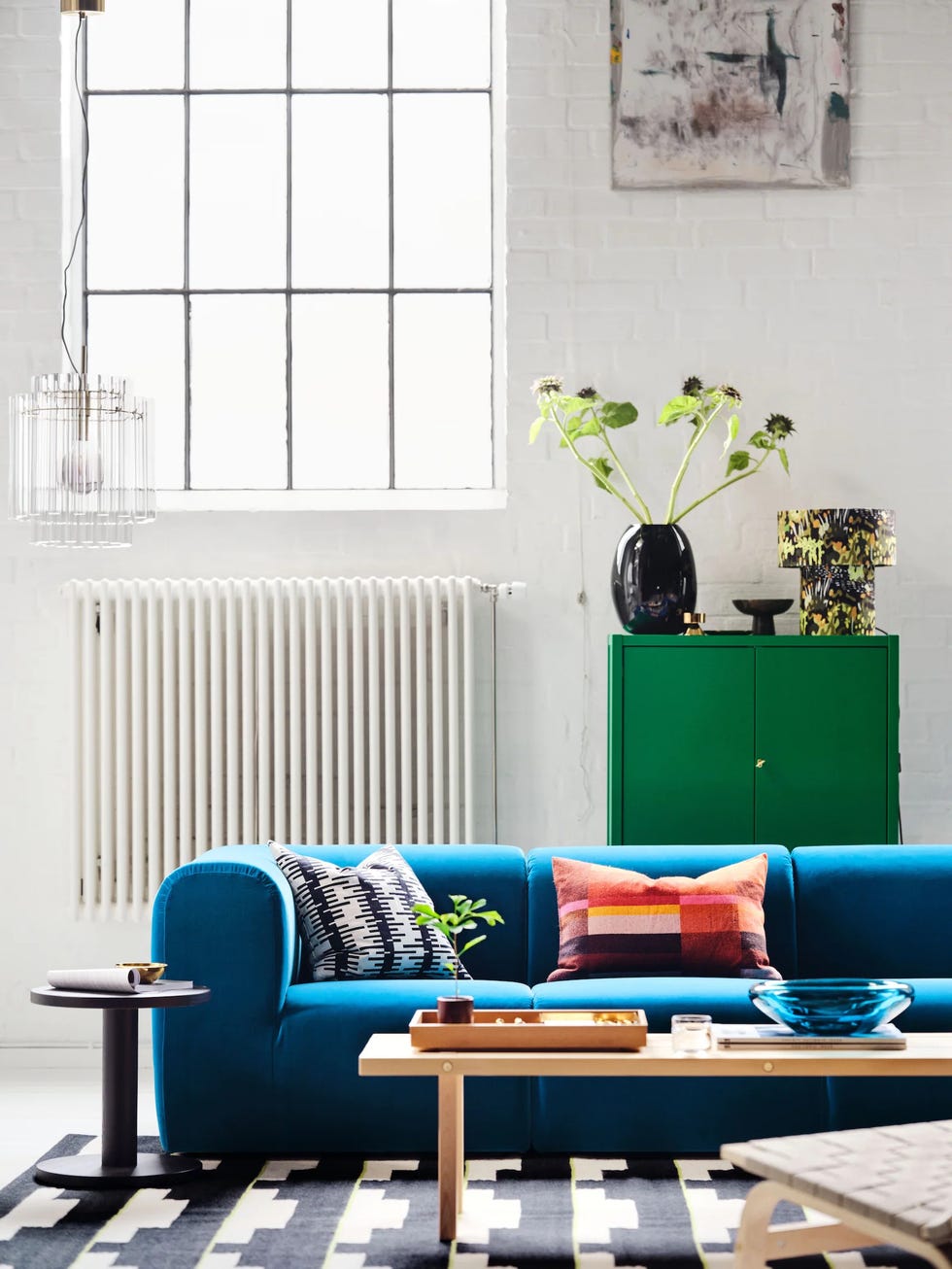 living room with a blue sofa