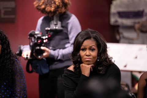 michelle obama being filmed by nadia hallgren for the netflix documentary, "becoming"