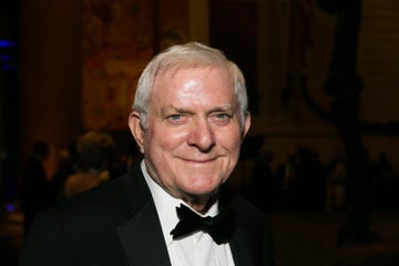 phil donahue attends ceremony wearing a black tuxedo