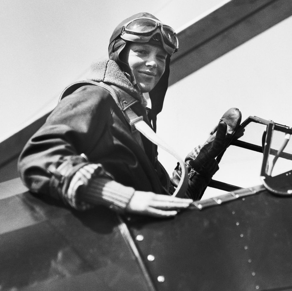 amelia earhart in airplane cockpit
