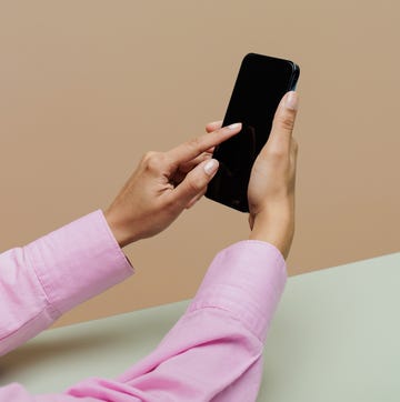 Mobile Phone use woman using her mobile phone