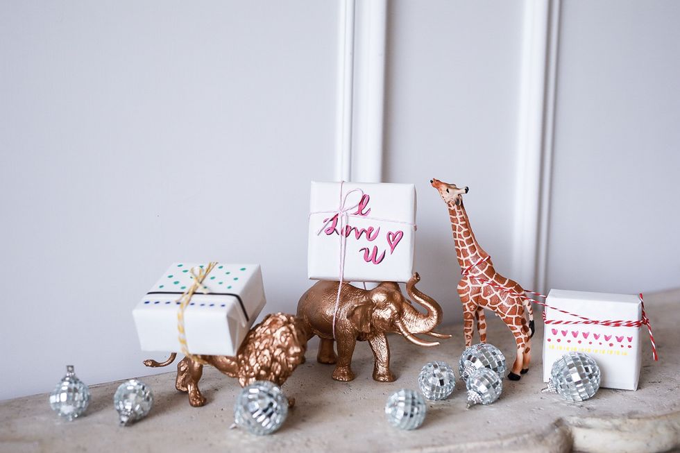 Giraffe, Giraffidae, Pink, Room, Party favor, Furniture, Present, Christmas ornament, 