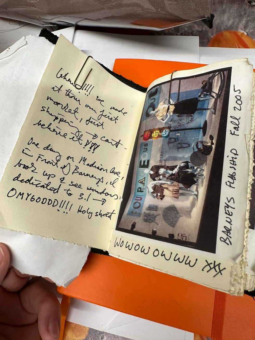a photo from phillip lim's personal scrapbook with a picture of the brand's 2005 barneys window takeover and a handwritten note he wrote at the time