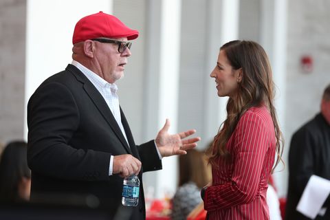 tampa, fl  april 10, 2019   head coach bruce arians of the tampa bay buccaneers and ownerpresident tampa bay buccaneers foundation and glazer family foundation darcie glazer kassewitz at the 2019 women of red luncheon in bar 76 at raymond james stadium in tampa, fl photo by kyle zedakertampa bay buccaneers