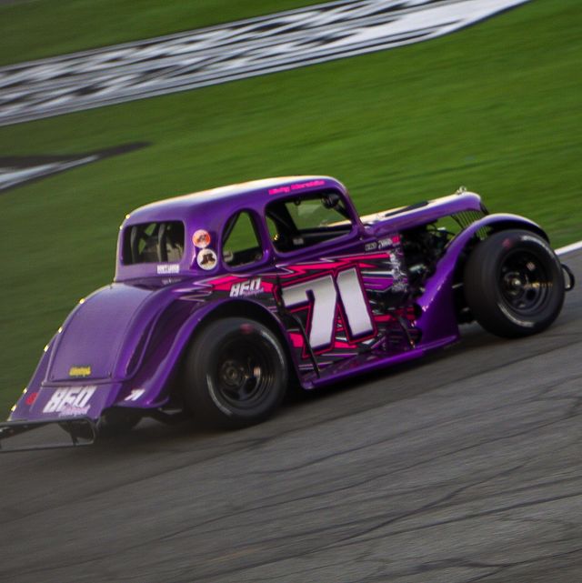 purple legends race car on track