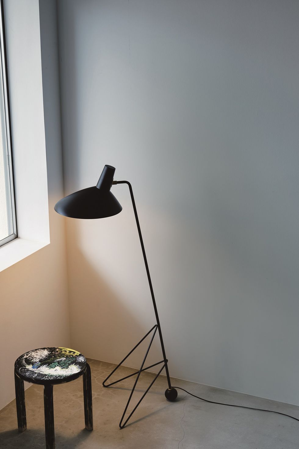 a lamp on a stand