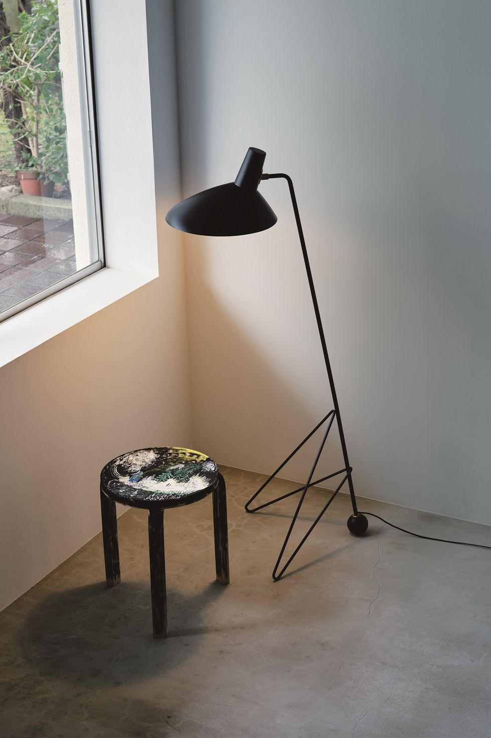 a lamp on a stand