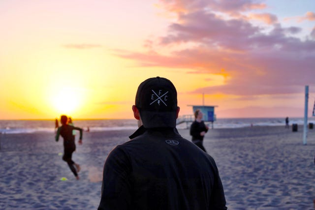 Runner looking into sunset