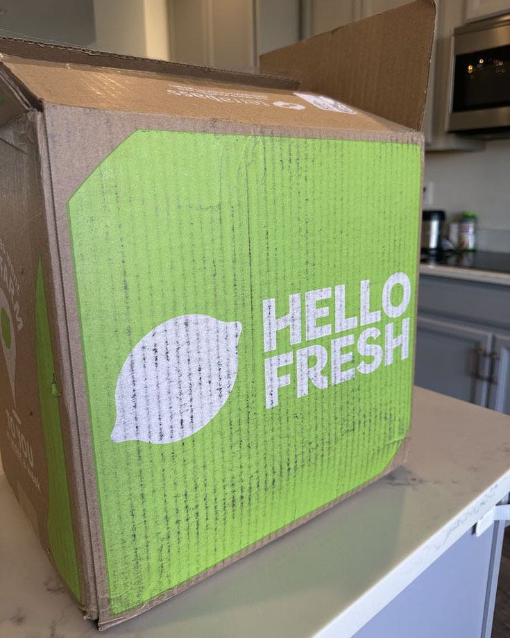 a green box with a white logo on it