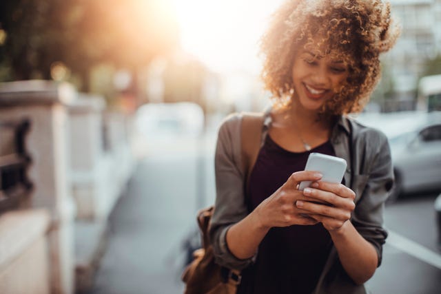 Photo of a woman using smart phone