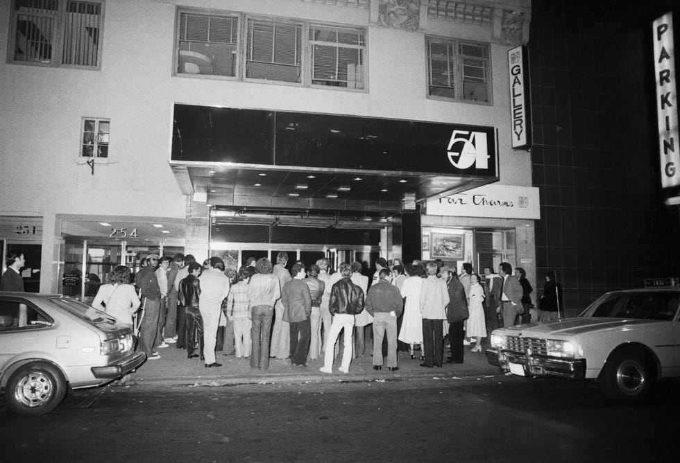 crowd standing in front of studio 54