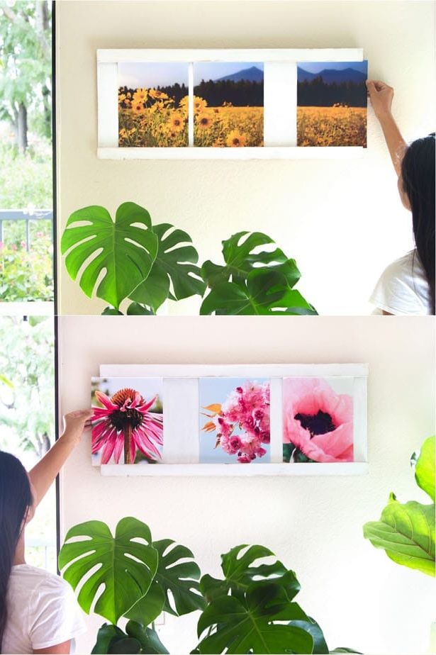 family photo wall ideas, woman taking a picture out of her collage photo frame