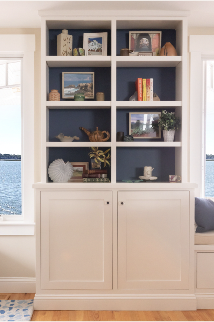 family photo wall ideas, photos and decor featured inside a built in bookshelf