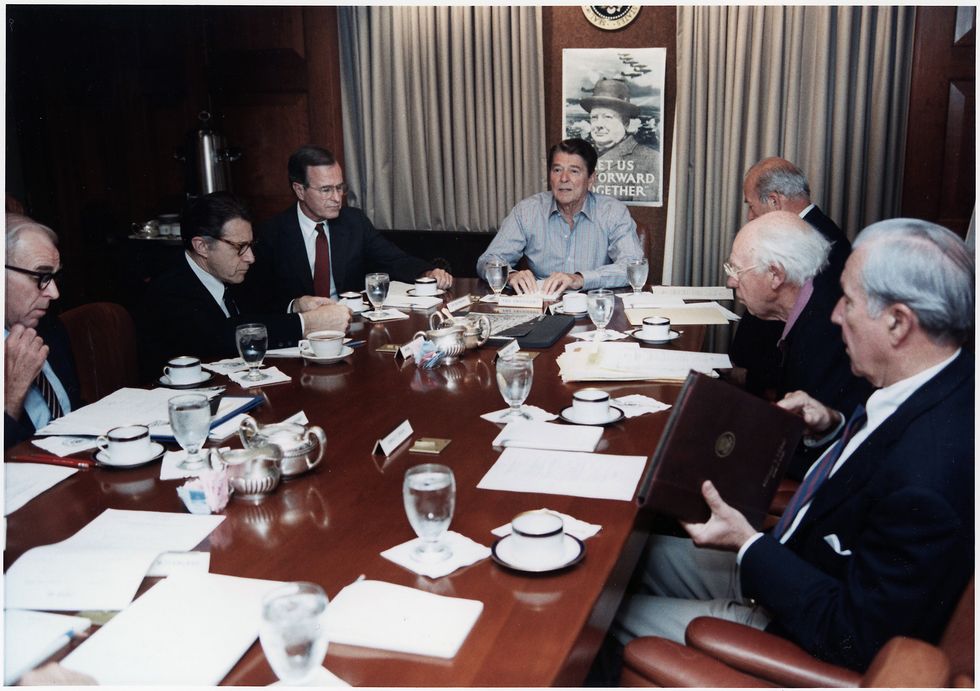 president ronald reagan holding a national security council meeting