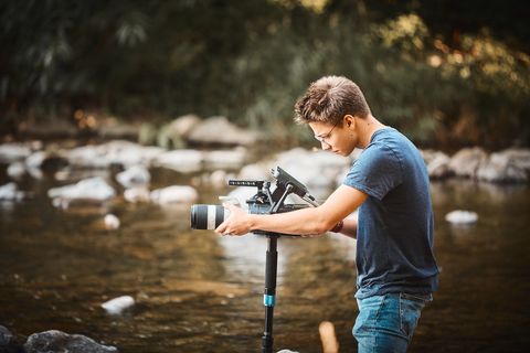 Photographer shoots with production camera