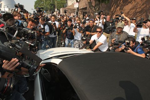 photographers mob britney spears' car as