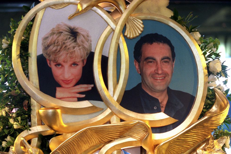 princess diana and dodi fayed memorial at harrods includes framed photos of both in front of white roses and other floral greenery
