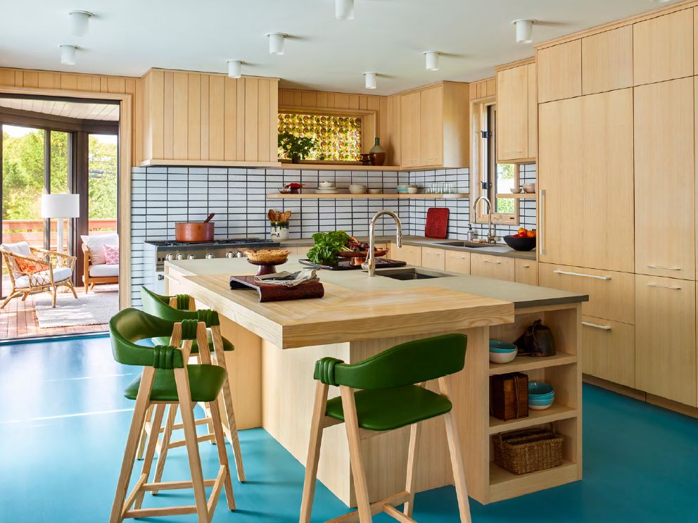wood kitchen with island and green counter stools