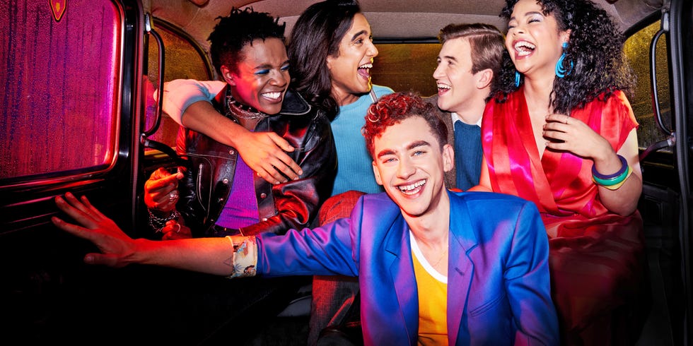 group of people in a car showcasing vibrant attire and an intimate atmosphere