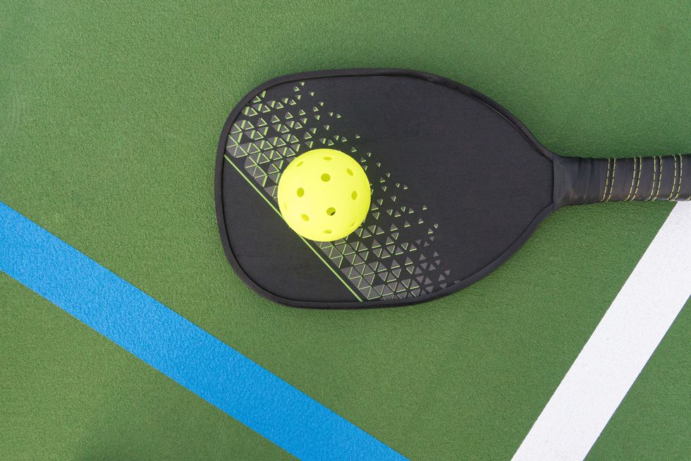 pickleball paddle and ball