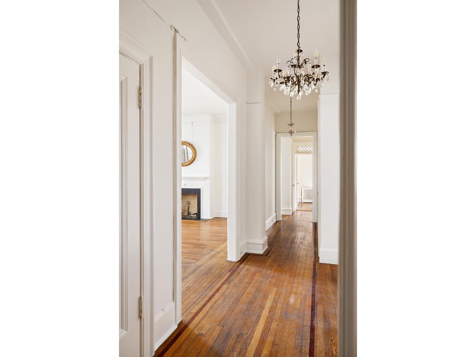 throughout apartment 8a are ﻿original inlaid floors, crown moldings, ﻿and two decorative fireplaces. ﻿