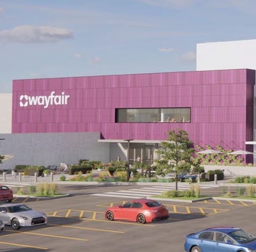 wayfair store opening a building with cars parked in front