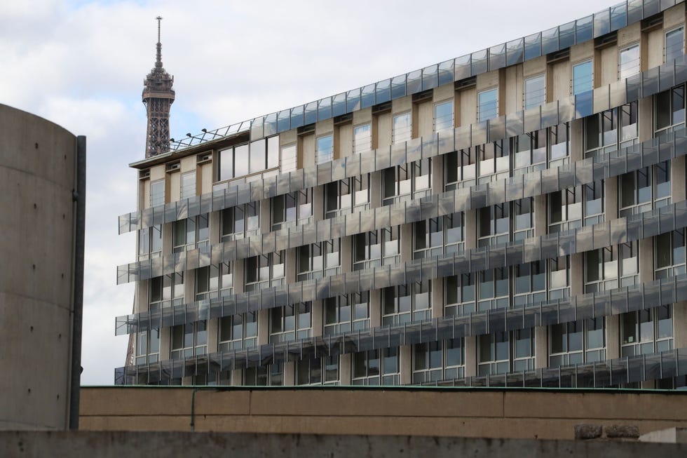 office building with eiffel tower in background