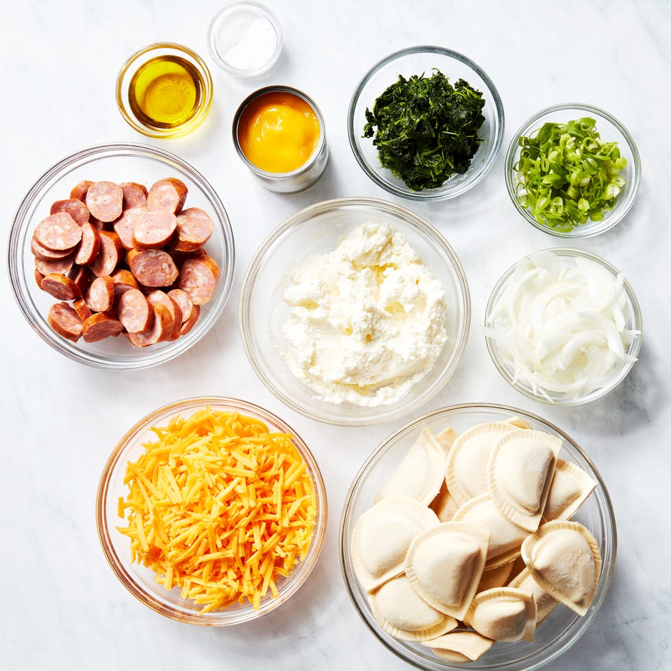 casserole dish filled with pierogis and cheese