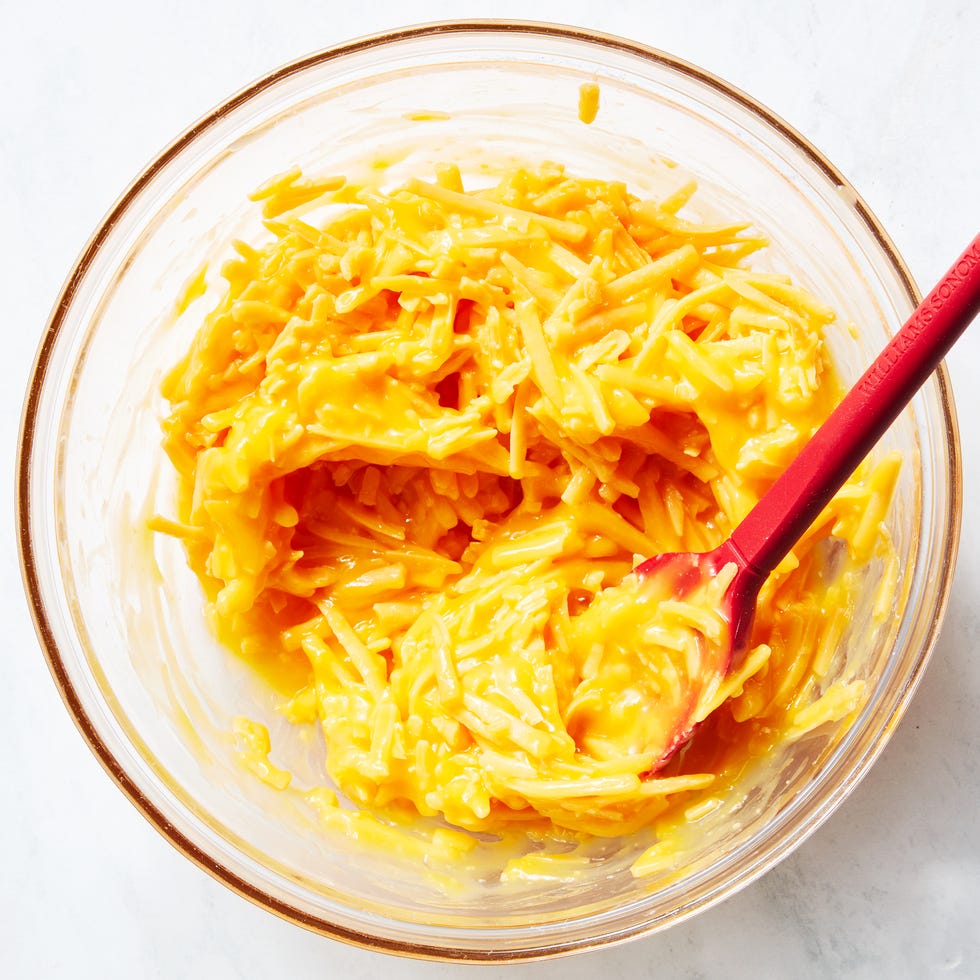 casserole dish filled with pierogis and cheese