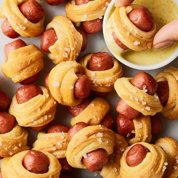 pigs in a blanket with a mustard dippings sauce
