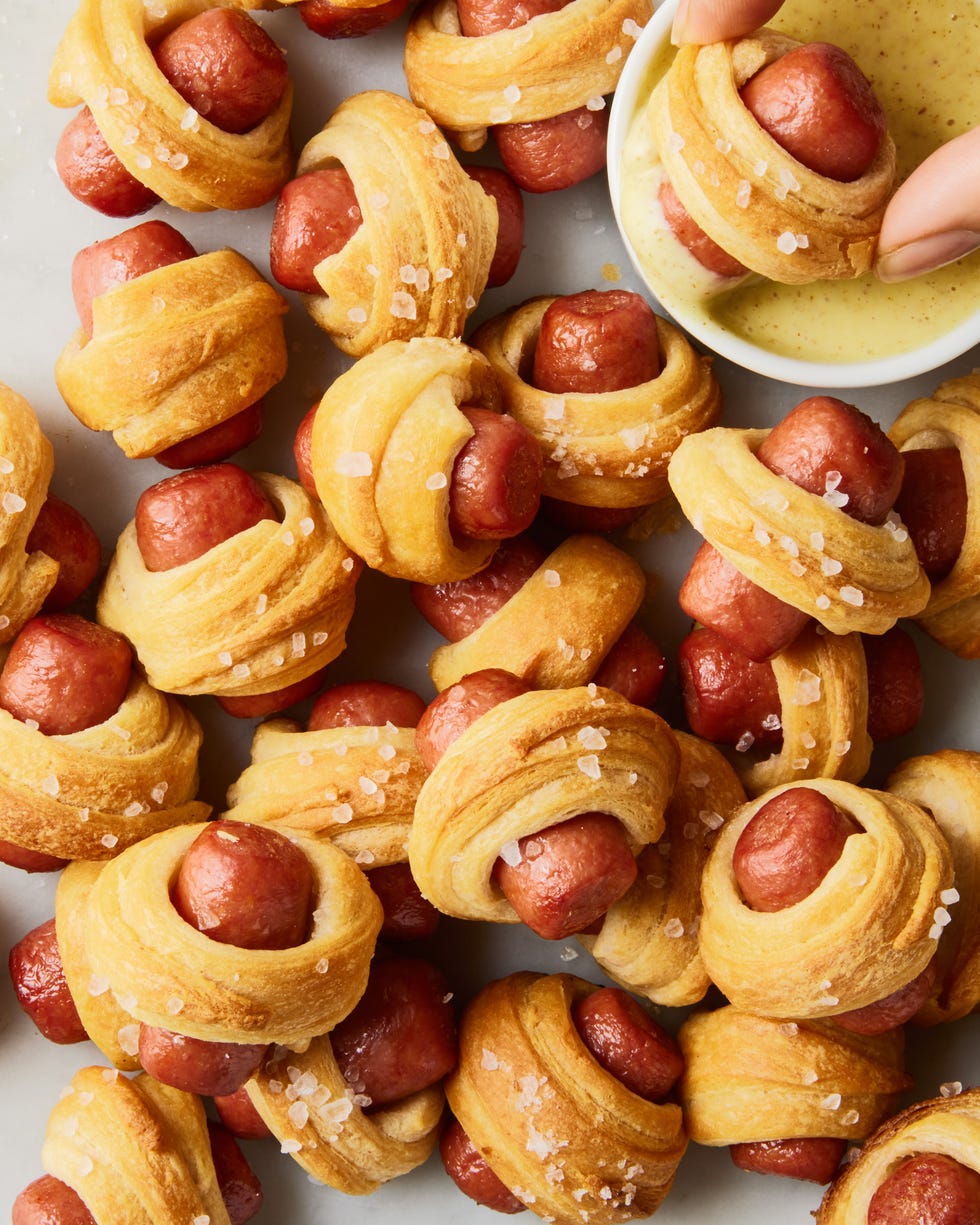 pigs in a blanket with a mustard dippings sauce