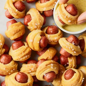 pigs in a blanket with a mustard dippings sauce