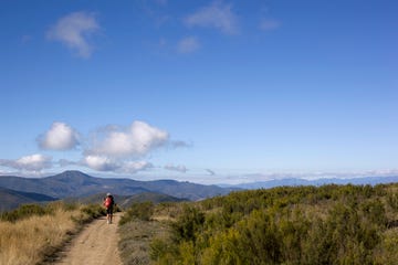 Pilgrim trekker walking in the Spanish mountains