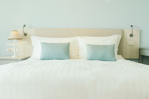 pillows on bed in bedroom