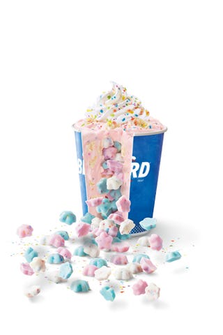 pinata party blizzard with the center cut open to show the confetti chocolate inside
