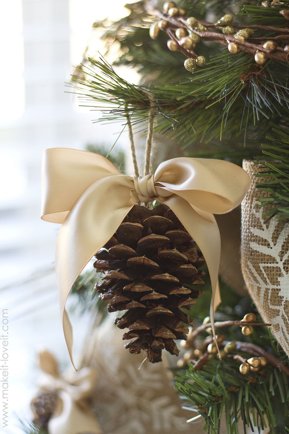 Wiring pine cones to make Christmas decorations
