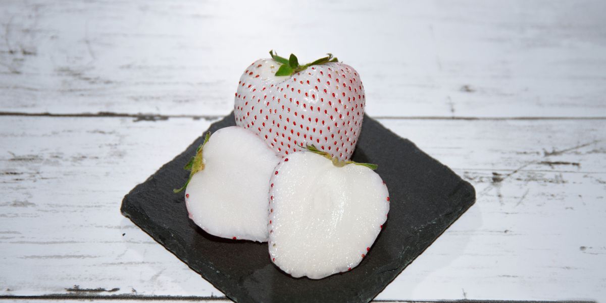 pineberry white strawberry and the fruit in half