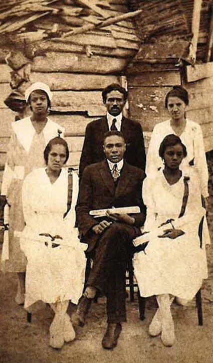 a group of people posing for a photo